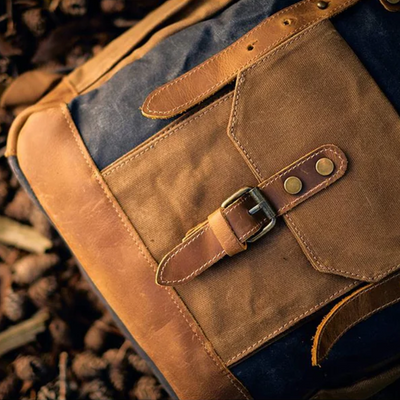 ROVIK – 蜡质帆布翻盖背包（男女皆宜）