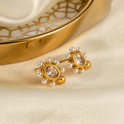 Elegant gold earrings with natural pearls