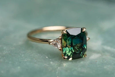 Vintage style gold ring with green gemstone