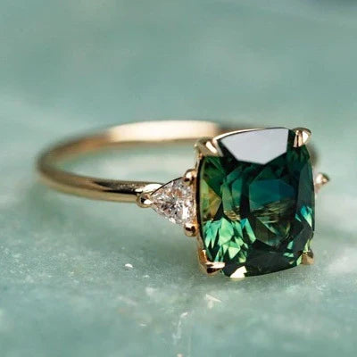 Vintage style gold ring with green gemstone